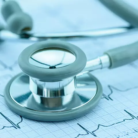 Stethoscope on cardiogram