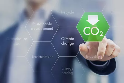 Finger pointing to CO2 sign